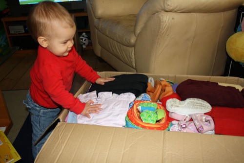 Mackenzie helps open Michelle's box