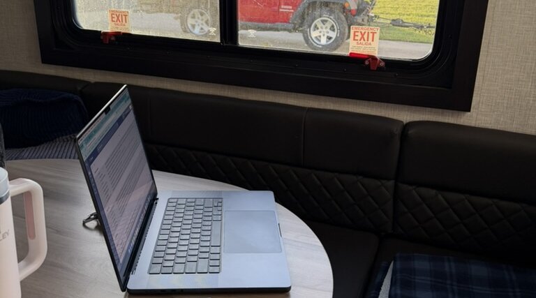 Laptop set up at the dinette of our fifth wheel