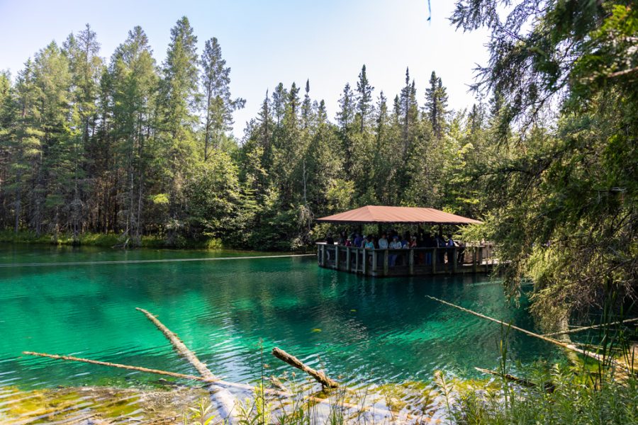 The clear green water of Kitch-iti-kipi spring in Michigan’s Upper Peninsula