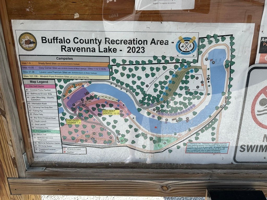 Buffalo County Recreation Area Ravenna Lake campground map posted at the entrance kiosk