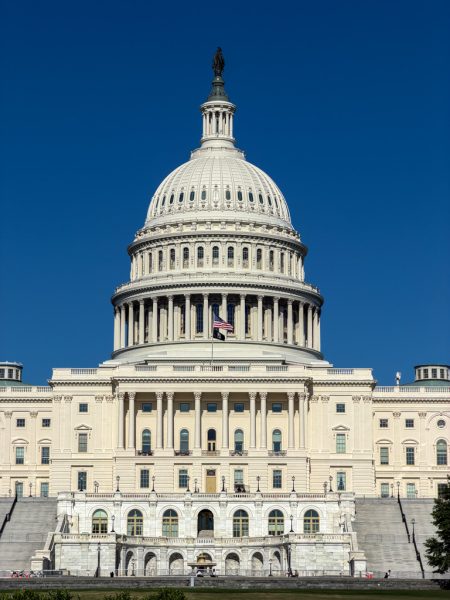 The U.S. Capitol dome against a deep blue evening sky