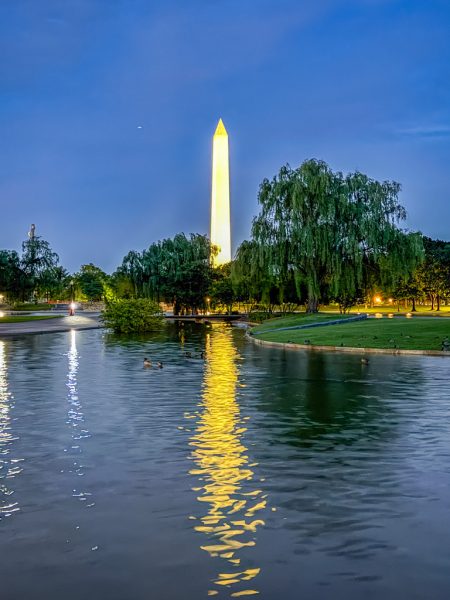 The Washington Monument reflected in the water at dusk