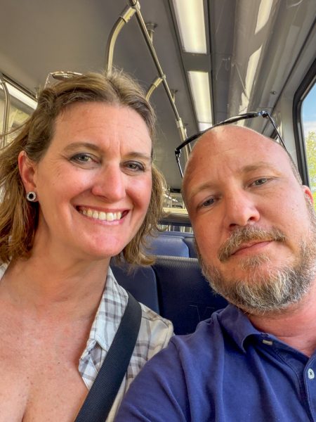 Tiffany and Stefan riding the Metro into Washington, DC