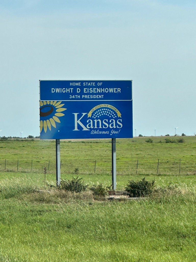 Welcome to Kansas sign along the highway on the drive north from Oklahoma to Nebraska